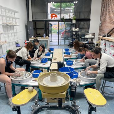 Classroom with pottery wheels at Community Clay