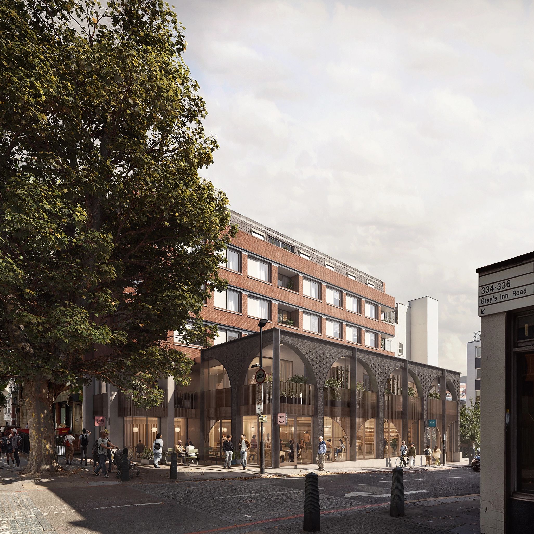 Modern building with arches and people outside on Gray's Inn Road.
