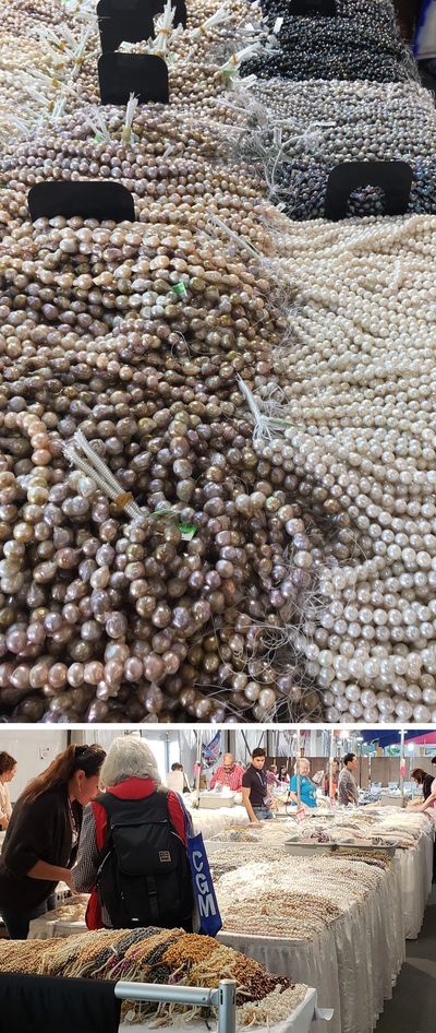 Cultured pearls stacked high on tables at the Tuscon, Arizona gem show