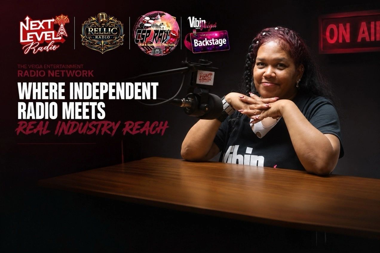 Woman sitting at a radio station microphone with a promotional banner.