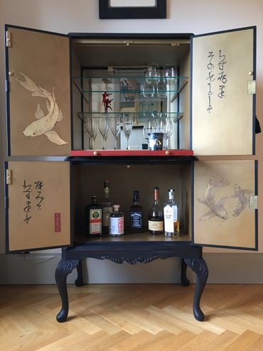 KOI AND CALLIGRAPHY - decorated the interior of the cabinet with gold leaf koi and calligraphy 