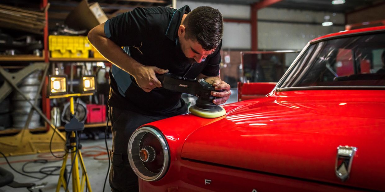 Shane on the tools, detailing a Falcon XM