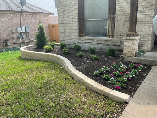 Front yard landscaping, marble masonry, plant, and trees