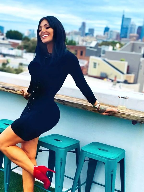 Gina Roscioli on Rooftop owner of gmarieblog,com