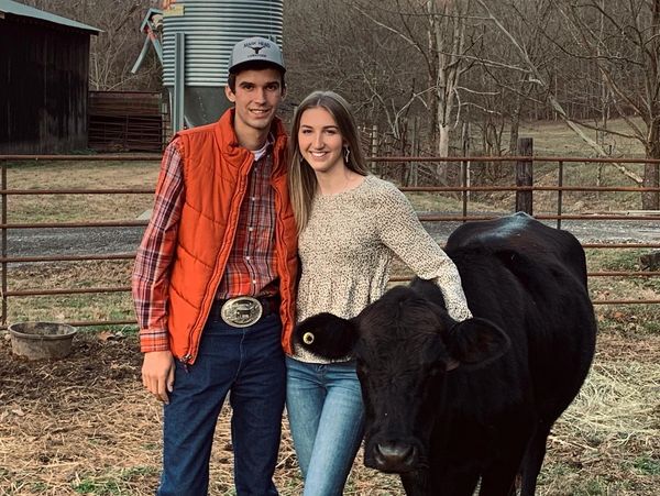 Carter and Landry with Landry's first cow, Cebu.