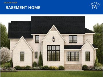Modern basement home exterior with white siding and black roof.