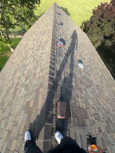 Completed brown re-roof with all new roof penetrations 