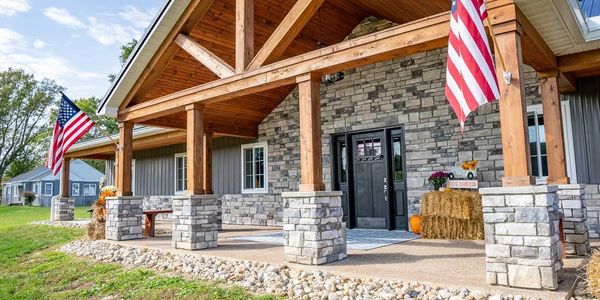 House displaying exterior home products like stone and vinyl siding