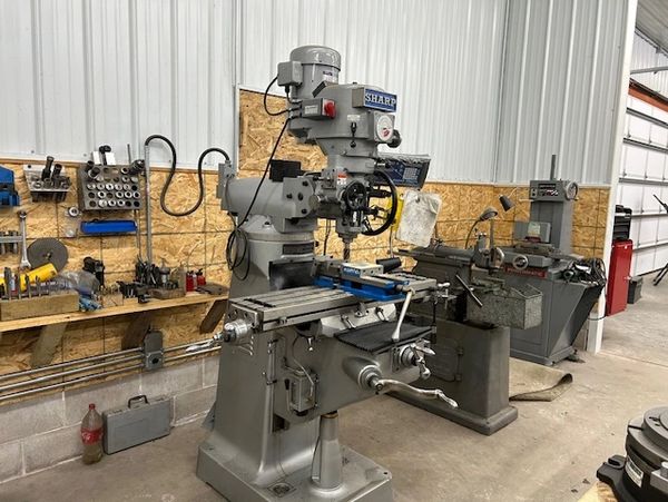 Vertical machine in a workshop.