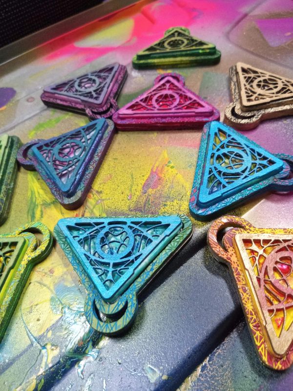 Custom all seeing eye necklaces for Elysium Festival