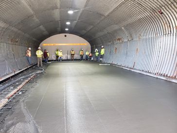 A group of people are working in a room