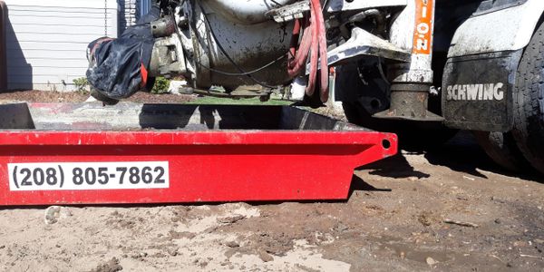 red bin, concrete washout, concrete pump truck, wash ut, red tub