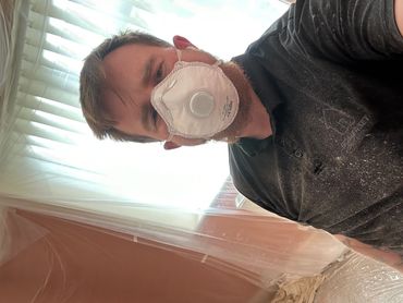 Owner and operator of Somerset Home Service pictured on a decorating job in Somerset