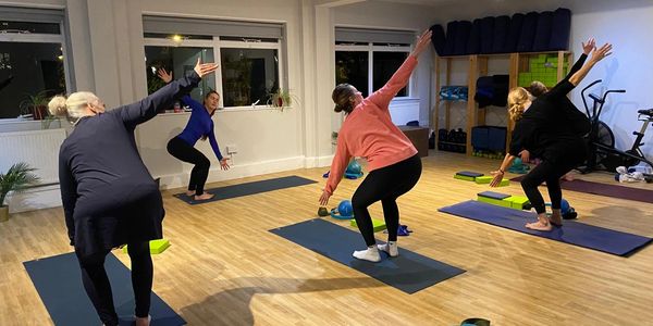 Group of people on a Pilates session
