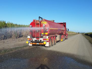 Dust suppression with mine spec trucks