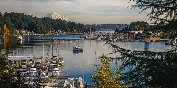 Gig Harbor view of Mt Rainier and deep-water marina in the harbor. 