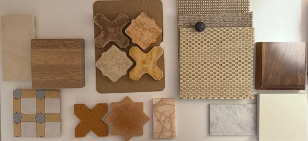 Varied tile and fabric samples arranged neatly.