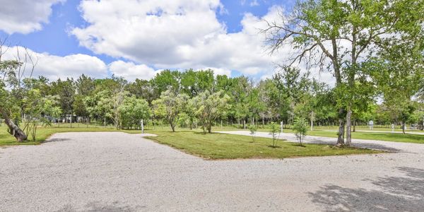 RV Sites 11 and 12 at Cedar Bend RV Park in Bertram Texas. Large, Level, Full Hookups