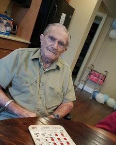 Male resident playing Bingo.