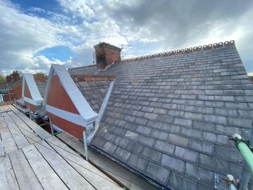 Full slate roof replacement with new lead valleys