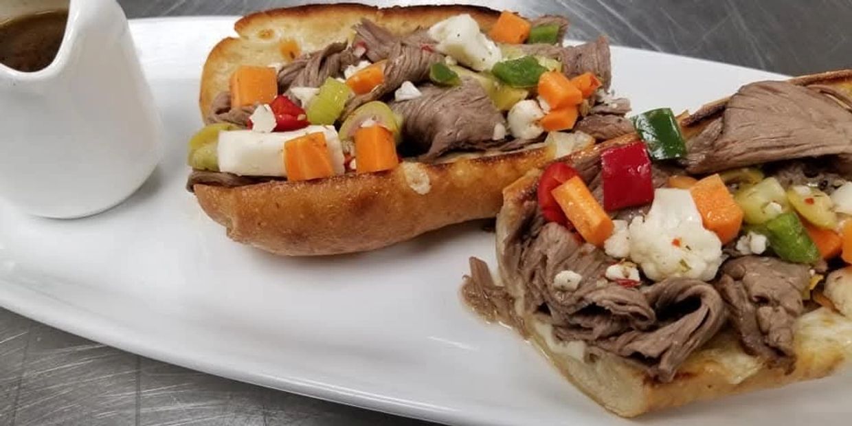 Chicago Italian Beef Sandwich with Giardiniera & Beef Au Jus.