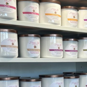 Soy candles in white jars with bronze lids at HK Craft House at Northlake Mall in Charlotte, NC