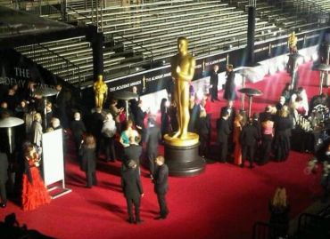 People on the red carpet at the Academy Awards event.