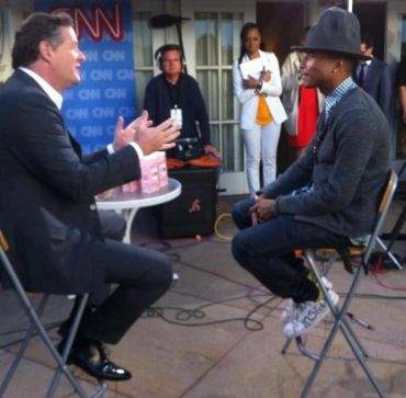 Two men having a conversation during a CNN interview.