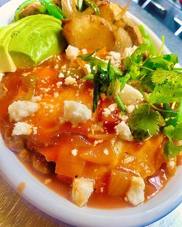 Huevos Rancheros, made with our house-made rancheros sauce
