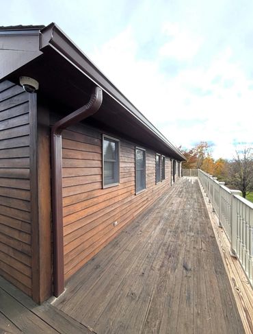 Brown commercial size gutters in Newburgh, NY