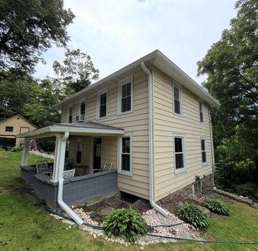 White seamless gutters in Hyde park, NY