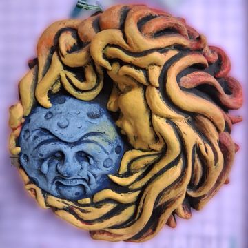 Sun and moon sculpture