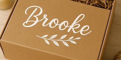 A box with the name Brooke in script font
