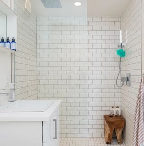 A walk in shower stall following the renovation for a mobility challenged customer.