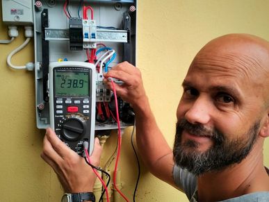 Electrician performs electrical test