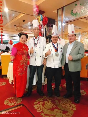 Judy, Chef Lupe, Chef Bill Yee, & friend giving thumbs up.