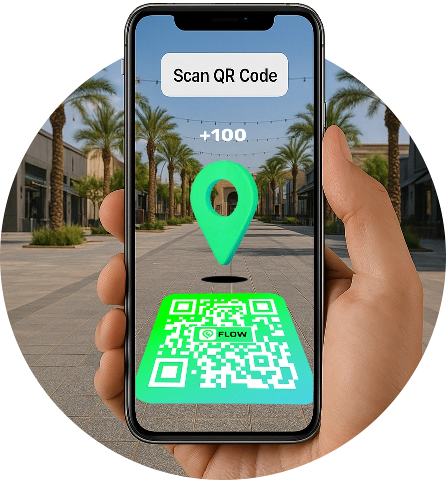 Hand holding phone scanning a green QR code with location pin in an outdoor setting.