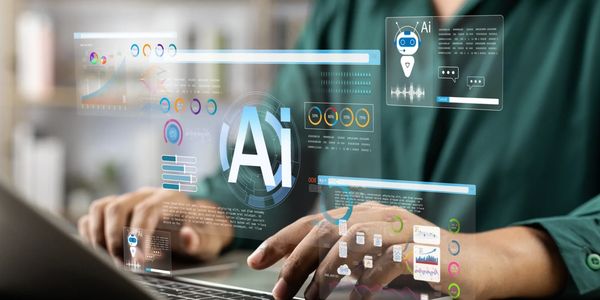 Person interacting with AI data visualizations on a laptop.