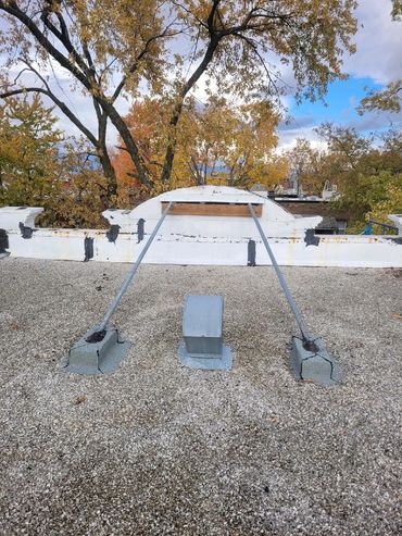 Reconstruction de tête de mur (parapet). Étanchéité et solidité au sommet du bâtiment.