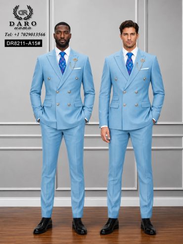 Two men in matching light blue suits with patterned blue ties.
