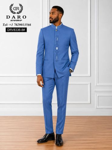 Man in a stylish blue suit with black shoes.