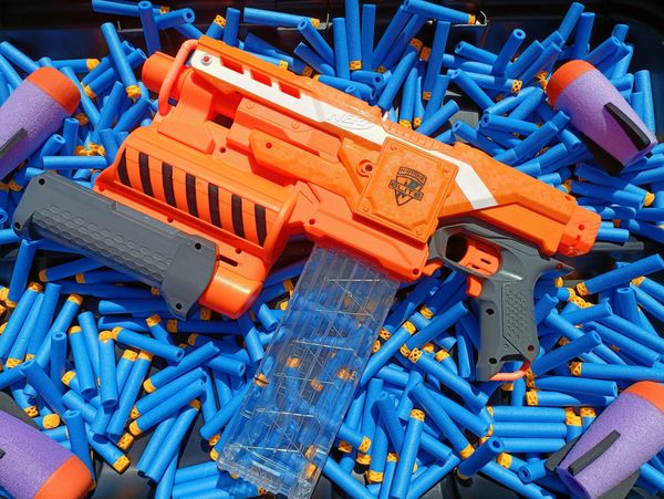 a Nerf blaster ready for a party