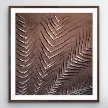 Framed textile artwork in brown pleated, tucked fabric with applique and machine stitched detail.