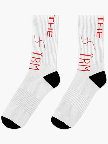 White socks with black heels and toes, "THE FIRM" in red letters.