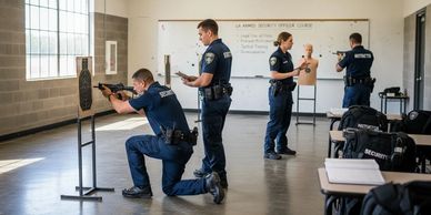 Security officers practicing marksmanship in a training room.