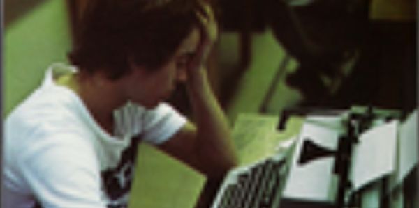 Me in my high school yearbook office (circa 1978).