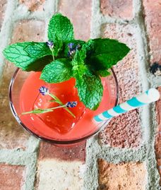 Watermelon Gimlet with fresh herbs.