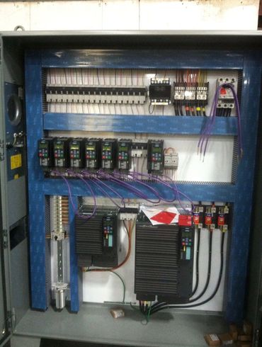 Electrical control panel with wiring and components.