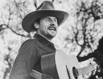 Ross Clayton with a guitar.