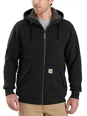 Man wearing a black hooded zip-up jacket.